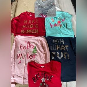 Never placed in dryer. Girls size 14-16 holiday shirts. Selling all 6 for $18